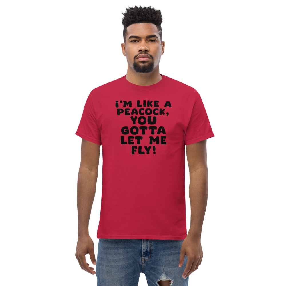 "I'm like a peacock, you gotta let me fly!" printed on a cardinal unisex classic tee worn by a male