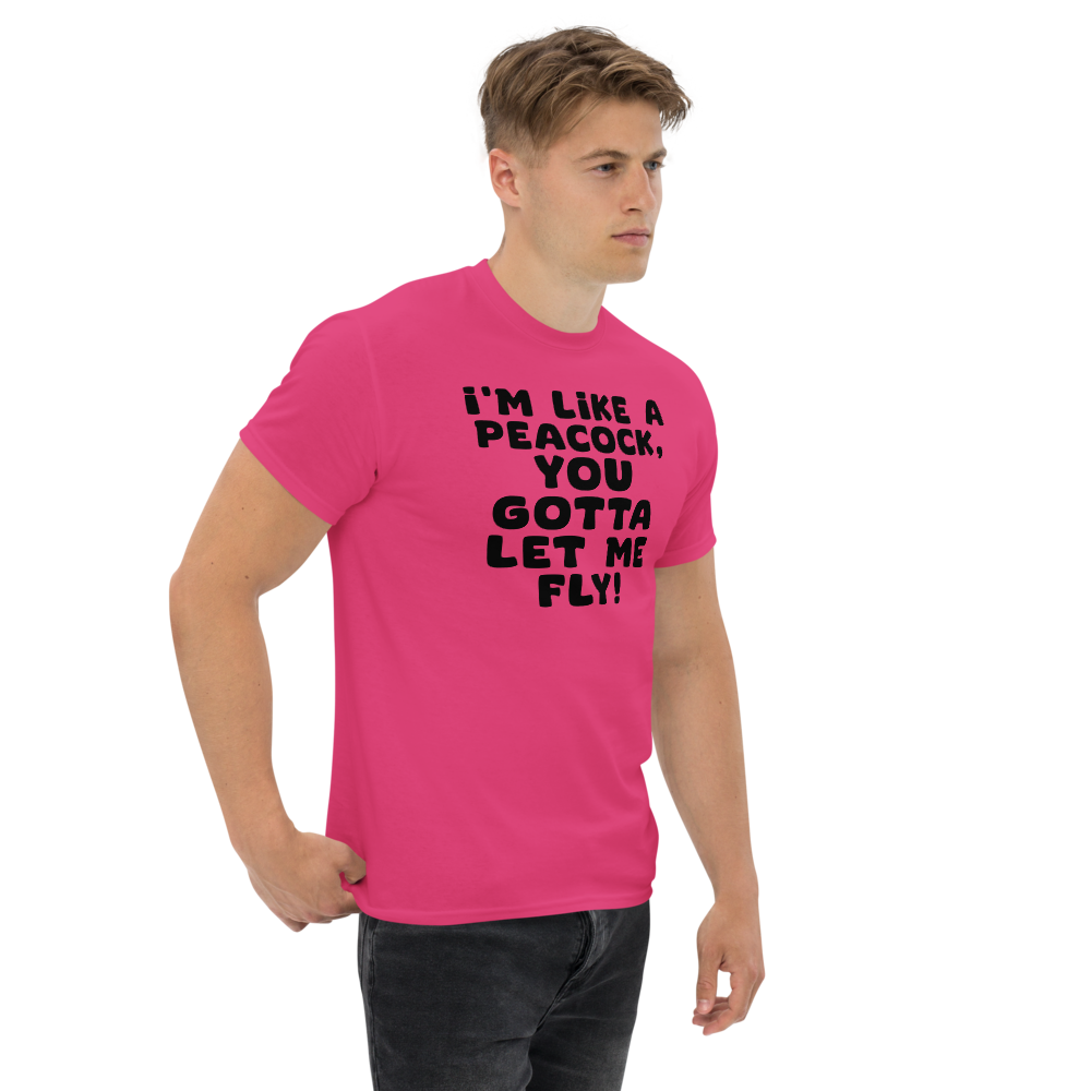 "I'm like a peacock, you gotta let me fly!" printed on a heliconia unisex classic tee worn by a male
