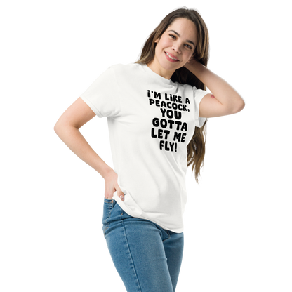 "I'm like a peacock, you gotta let me fly!" printed on a white unisex classic tee worn by a female