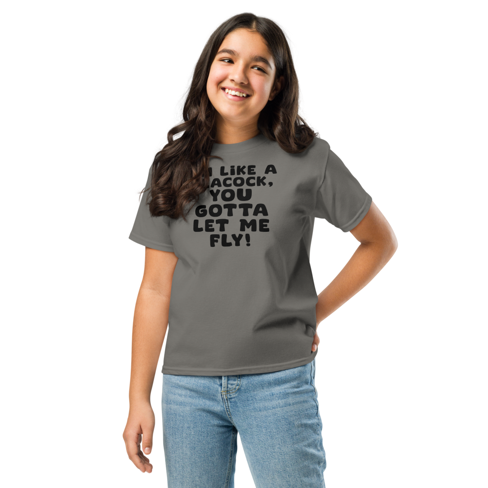 "I'm like a peacock, you gotta let me fly!" printed on a charcoal youth classic tee worn by a female