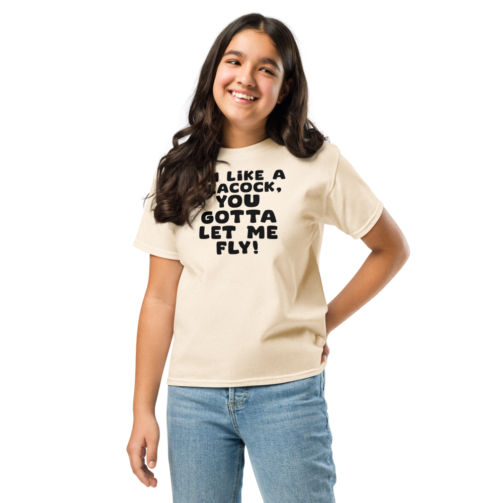 "I'm like a peacock, you gotta let me fly!" printed on a natural youth classic tee worn by a female