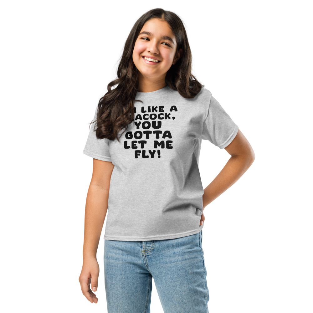 "I'm like a peacock, you gotta let me fly!" printed on a sport grey youth classic tee worn by a female