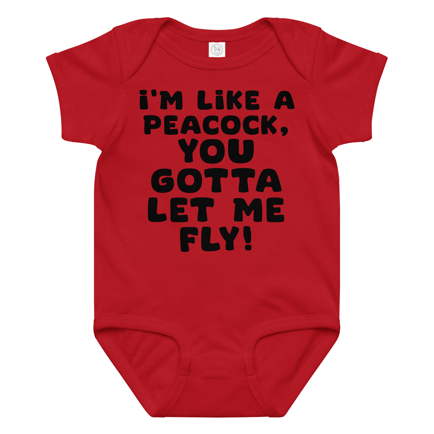 "I'm like a peacock, you gotta let me fly!" printed on a red baby jersey bodysuit laying on a flat surface amongst other clothes