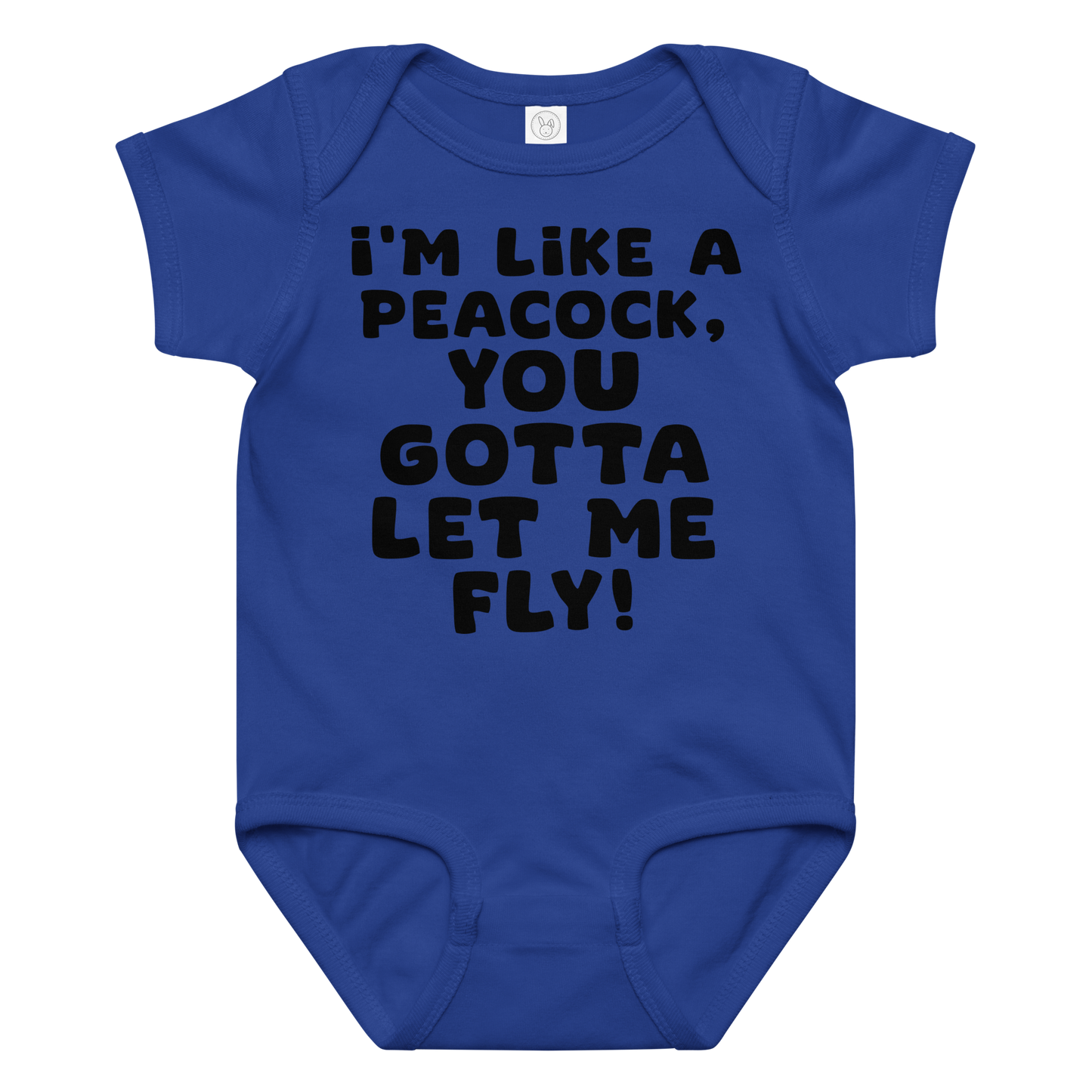 "I'm like a peacock, you gotta let me fly!" printed on a royal baby jersey bodysuit laying on a flat surface amongst other clothes
