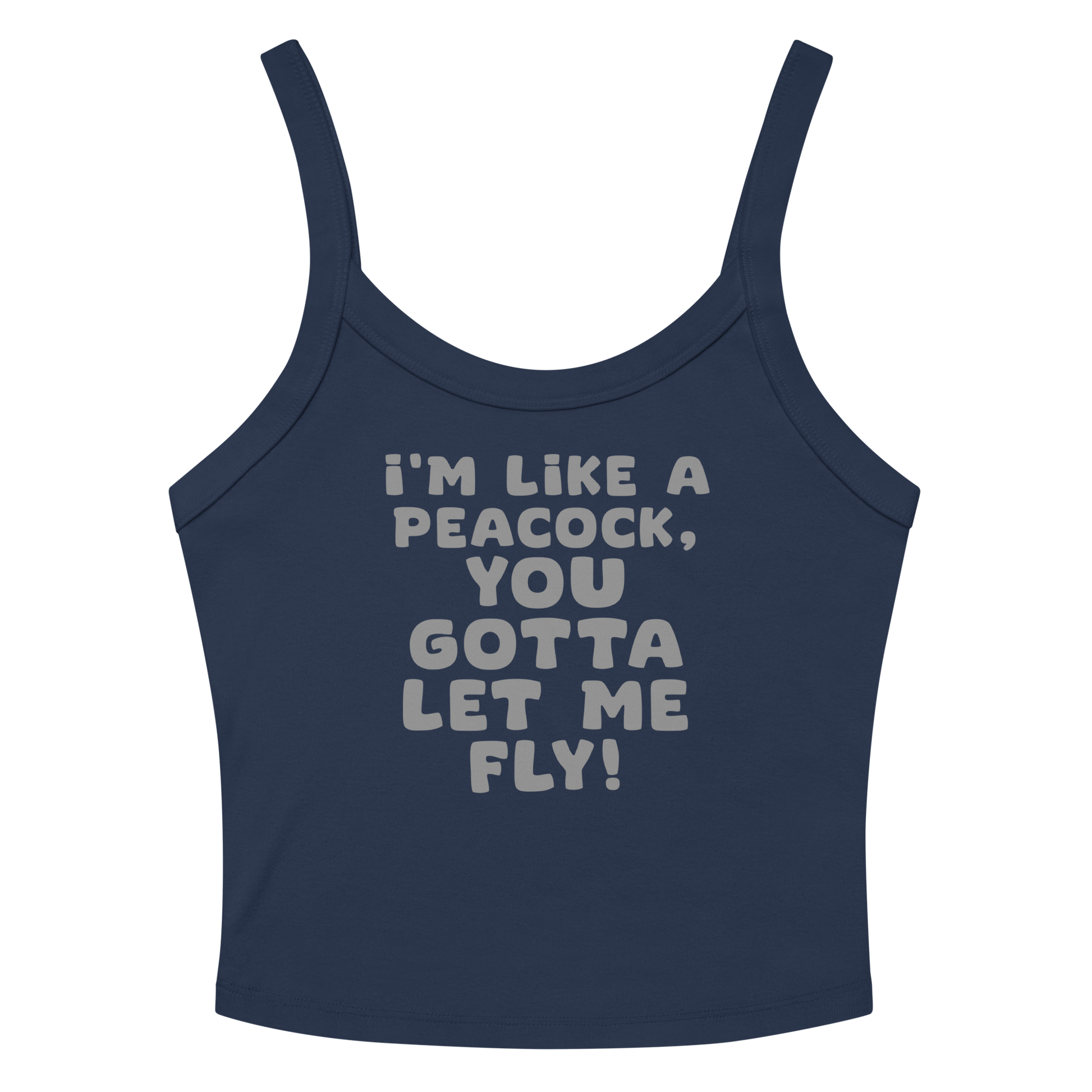 "I'm like a peacock, you gotta let me fly!" printed on a solid navy blend women's micro-rib tanktop laying on a flat surface amongst sunglasses and shorts