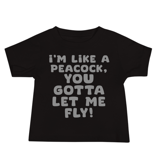 "I'm like a peacock, you gotta let me fly!" printed on a black baby jersey short sleeve tee laying on a flat surface