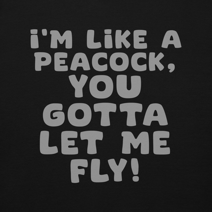 "I'm like a peacock, you gotta let me fly!" printed on a black background
