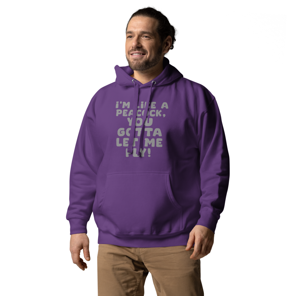 "I'm like a peacock, you gotta let me fly!" printed on a purple unisex hoodie worn by a male