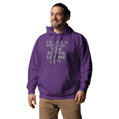 "I'm like a peacock, you gotta let me fly!" printed on a purple unisex hoodie worn by a male