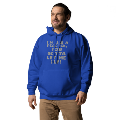 "I'm like a peacock, you gotta let me fly!" printed on a team royal unisex hoodie worn by a male