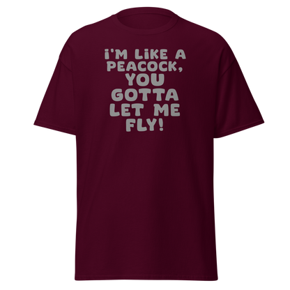 "I'm like a peacock, you gotta let me fly!" printed on a maroon on an invisible body