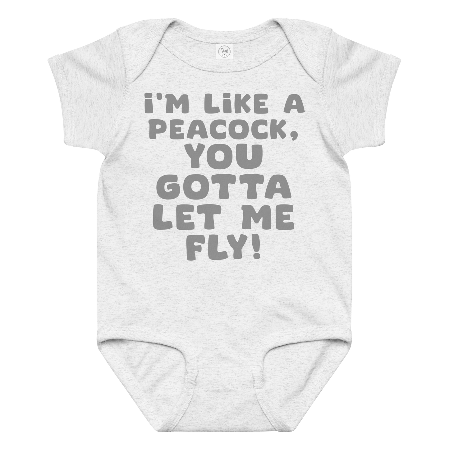 "I'm like a peacock, you gotta let me fly!" printed on a ash baby jersey bodysuit laying on a flat surface amongst other clothes