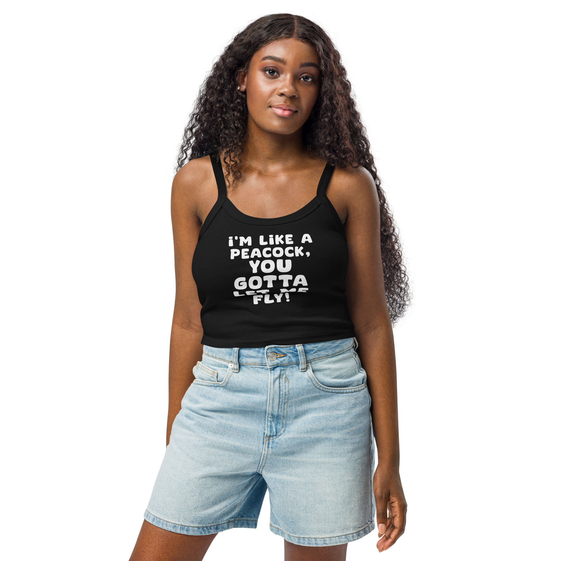 "I'm like a peacock, you gotta let me fly!" printed on a solid black blend women's micro-rib tanktop worn by a female