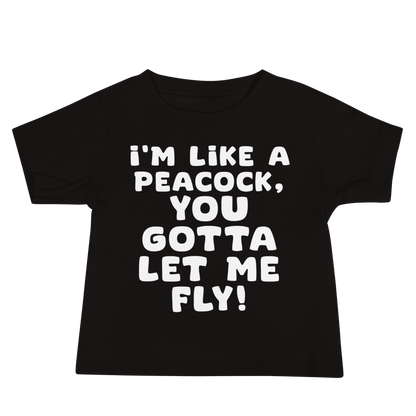 "I'm like a peacock, you gotta let me fly!" printed on a black baby jersey short sleeve tee laying on a flat surface