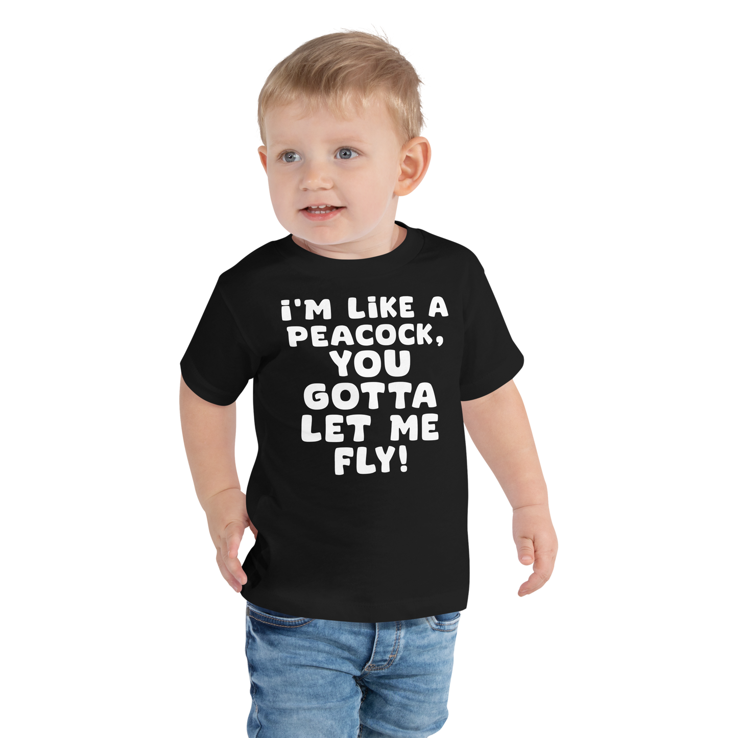 "I'm like a peacock, you gotta let me fly!" printed on a black toddler short sleeve tee worn by a male