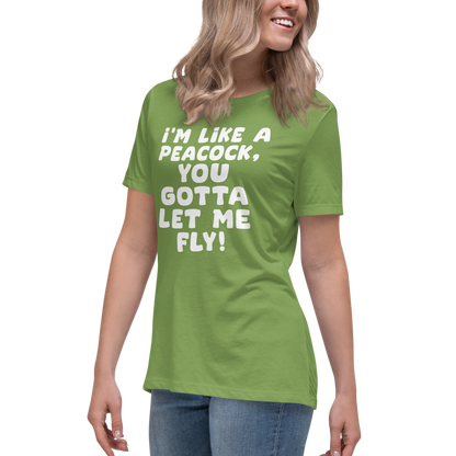 "I'm like a peacock, you gotta let me fly!" printed on a leaf women's relaxed t-shirt worn by a female