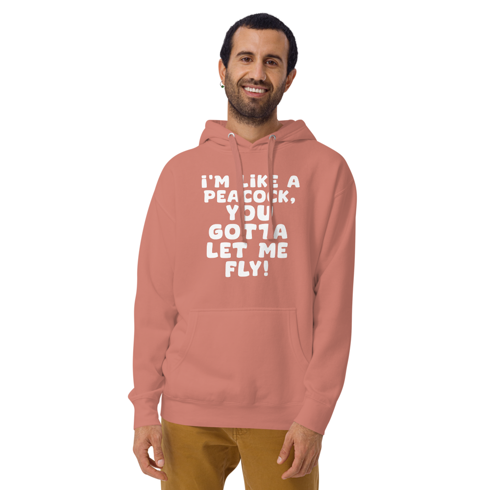 "I'm like a peacock, you gotta let me fly!" printed on a dusty rose warn by a male