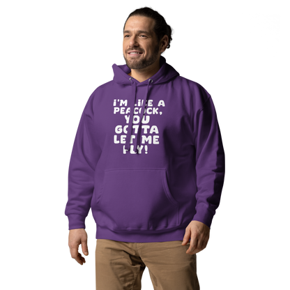 "I'm like a peacock, you gotta let me fly!" printed on a purple unisex hoodie worn by a male