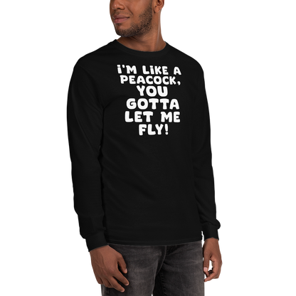 "I'm like a peacock, you gotta let me fly!" printed on a black men's long sleeve shirt worn by a male
