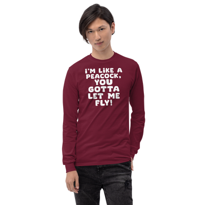 "I'm like a peacock, you gotta let me fly!" printed on a maroon men's long sleeve shirt worn by a male