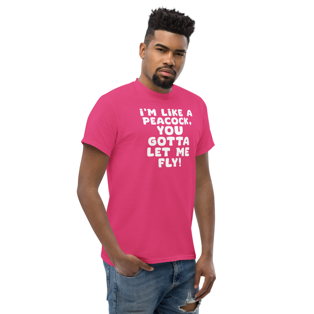 "I'm like a peacock, you gotta let me fly!" printed on a heliconia unisex classic tee worn by a male