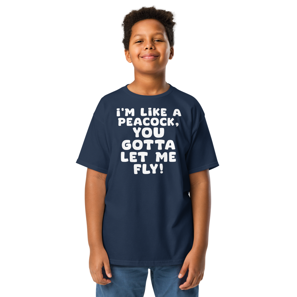 "I'm like a peacock, you gotta let me fly!" printed on a navy youth classic tee worn by a male