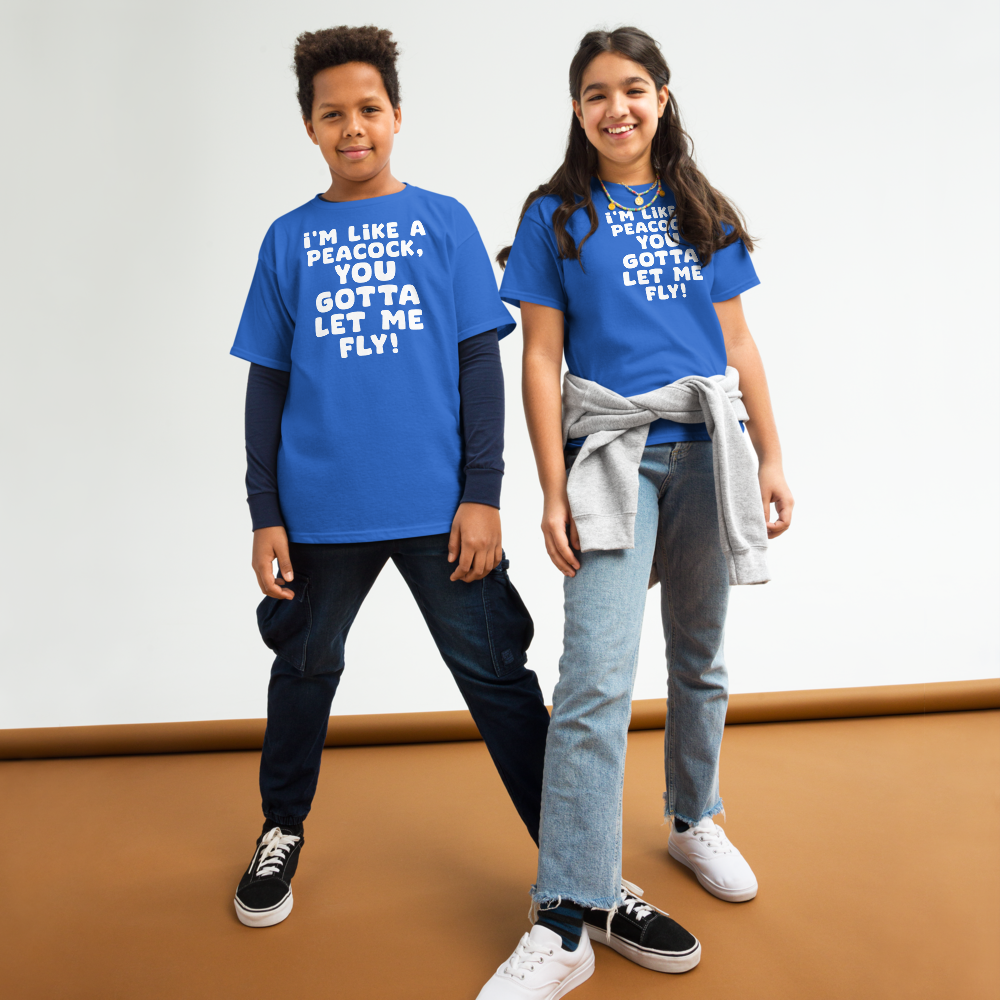 "I'm like a peacock, you gotta let me fly!" printed on a royal youth classic tee worn by a female and male
