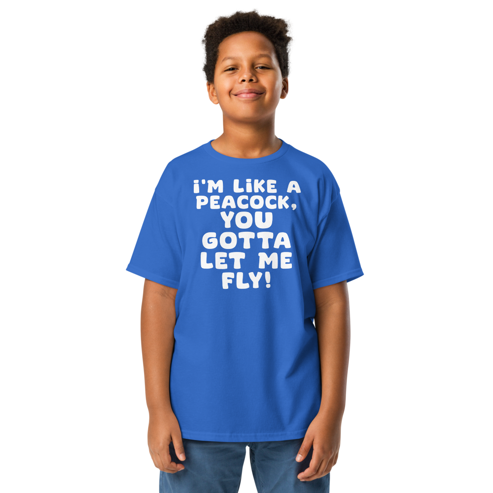 "I'm like a peacock, you gotta let me fly!" printed on a royal youth classic tee worn by a male