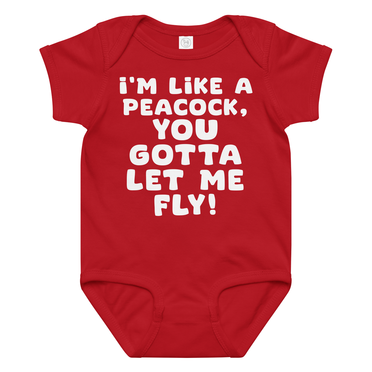 "I'm like a peacock, you gotta let me fly!" printed on a red baby jersey bodysuit laying on a flat surface amongst other clothes