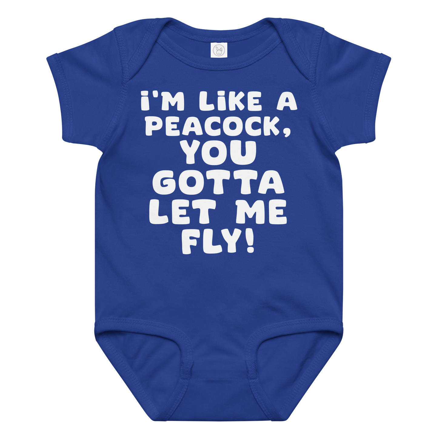 "I'm like a peacock, you gotta let me fly!" printed on a royal baby jersey bodysuit laying on a flat surface amongst other clothes
