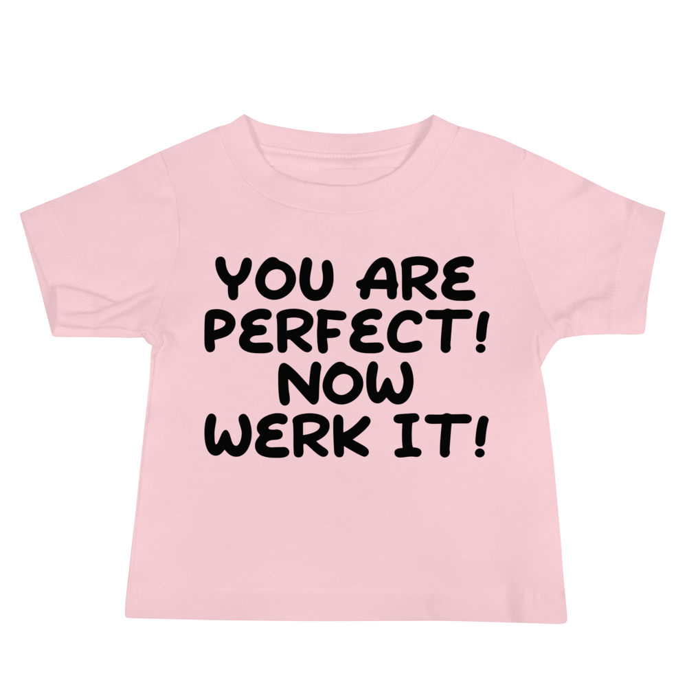 "You Are Perfect! Now Werk It!" printed on a pink baby jersey short sleeve tee laying on a flat surface