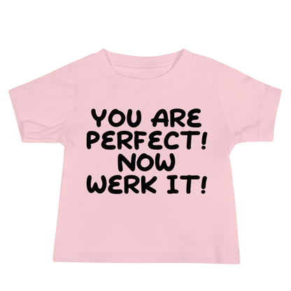 "You Are Perfect! Now Werk It!" printed on a pink baby jersey short sleeve tee laying on a flat surface