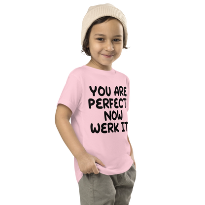"You Are Perfect! Now Werk It!" printed on a pink toddler short sleeve tee worn by a male who is also wearing a knit cap