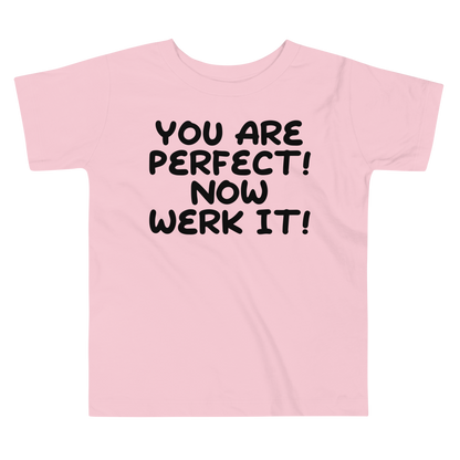 "You Are Perfect! Now Werk It!" printed on a pink toddler short sleeve tee laying on a flat surface