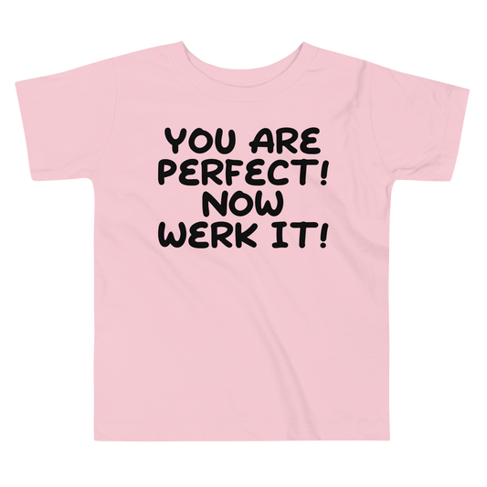 "You Are Perfect! Now Werk It!" printed on a pink toddler short sleeve tee laying on a flat surface