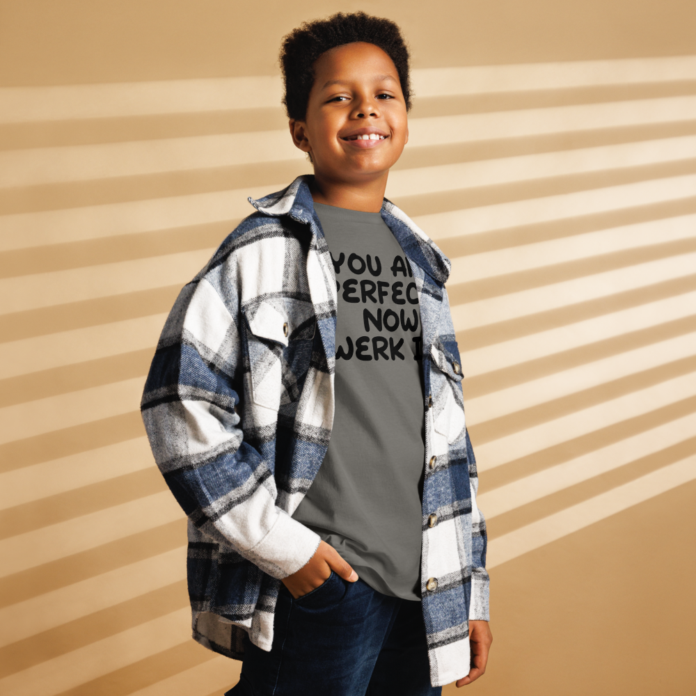 "You Are Perfect! Now Werk It!" printed on a charcoal youth classic tee worn by a male also wearing a jacket