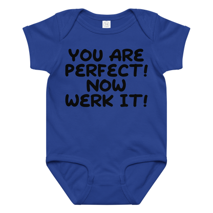 "You Are Perfect! Now Werk It!" printed on a royal baby jersey bodysuit laying on a flat surface amongst other clothes