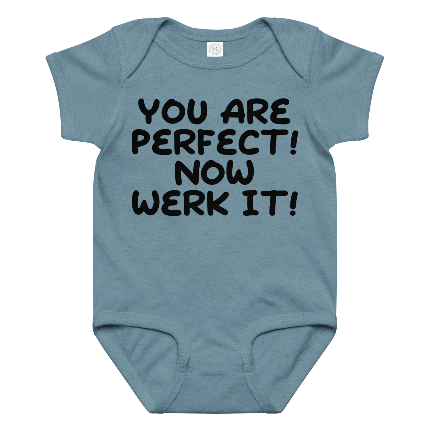 "You Are Perfect! Now Werk It!" printed on a vintage indigo baby jersey bodysuit laying on a flat surface amongst other clothes