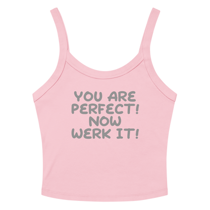 "You Are Perfect! Now Werk It!" printed on a solid pink blend women's micro-rib tanktop laying on a flat surface amongst sunglasses and shorts