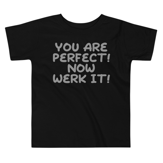 "You Are Perfect! Now Werk It!" printed on a black toddler short sleeve tee laying on a flat surface