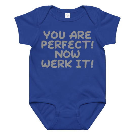 "You Are Perfect! Now Werk It!" printed on a royal baby jersey bodysuit laying on a flat surface amongst other clothes