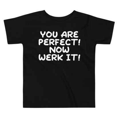 "You Are Perfect! Now Werk It!" printed on a black toddler short sleeve tee laying on a flat surface
