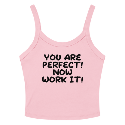 "You Are Perfect! Now Work It!" printed on a solid pink blend women's micro-rib tanktop laying on a flat surface amongst sunglasses and shorts