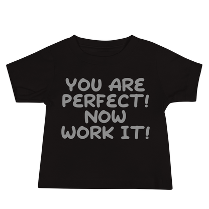 "You Are Perfect! Now Work It!" printed on a black baby jersey short sleeve tee laying on a flat surface