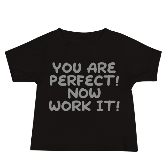 "You Are Perfect! Now Work It!" printed on a black baby jersey short sleeve tee laying on a flat surface