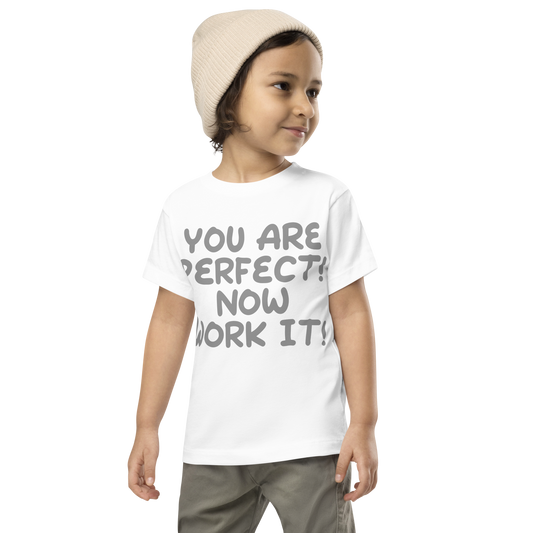 "You Are Perfect! Now Work It!" printed on a white toddler short sleeve tee worn by a male wearing a cap