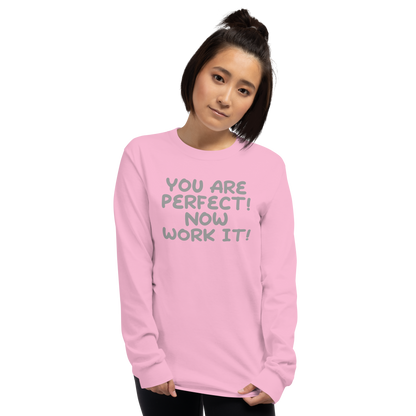 "You Are Perfect! Now Work It!" printed on a light pink men's long sleeve shirt worn by a female
