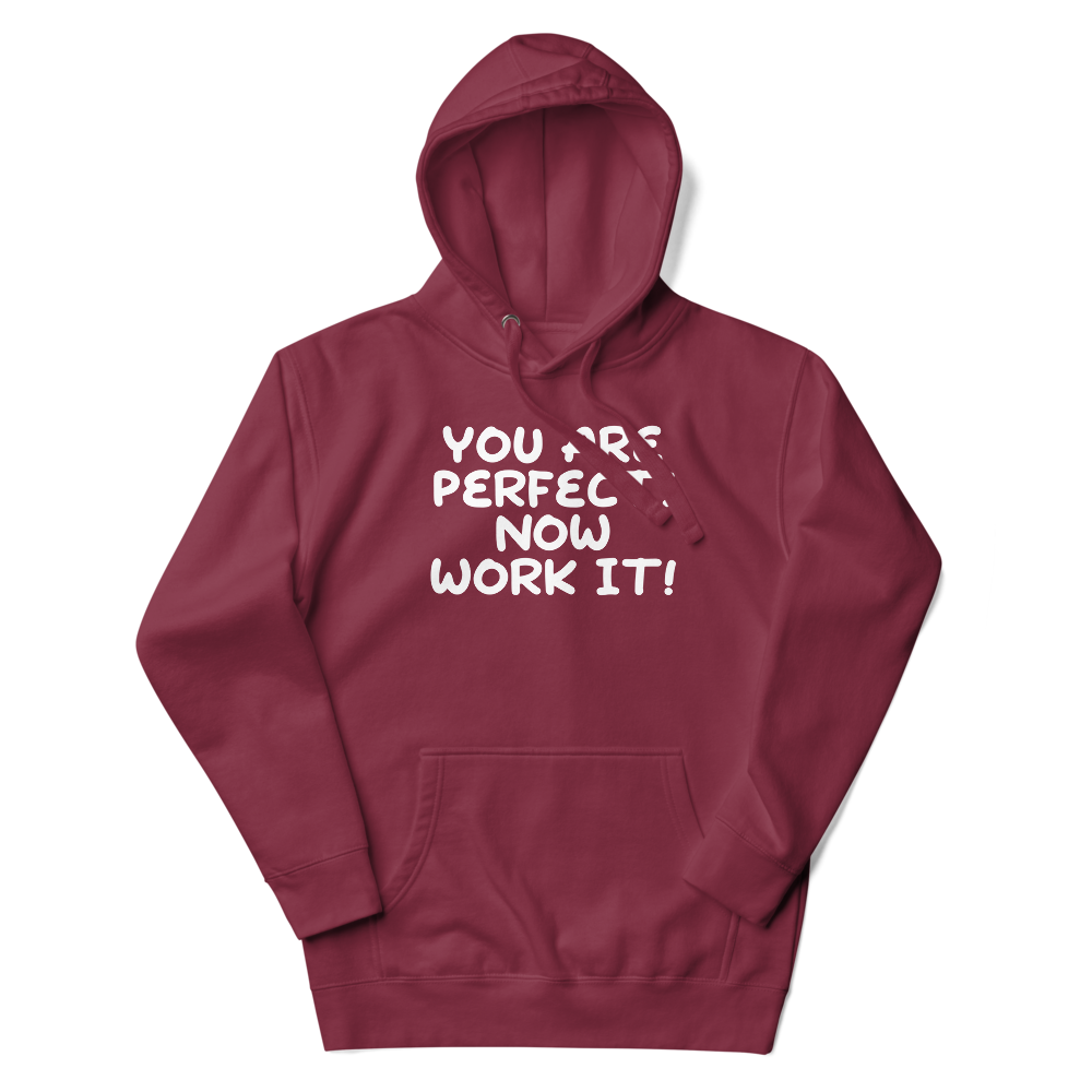 "You Are Perfect! Now Work It!" printed on a maroon unisex hoodie laying on a flat surface with the hood up