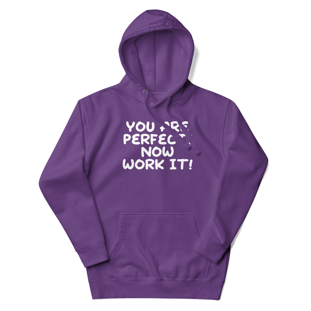 "You Are Perfect! Now Work It!" printed on a purple unisex hoodie laying on a flat surface with the hood up