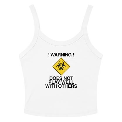 "!Warning! Does Not Play Well With Others" printed on a solid white blend women's micro-rib tanktop laying on a flat surface amongst sunglasses and shorts